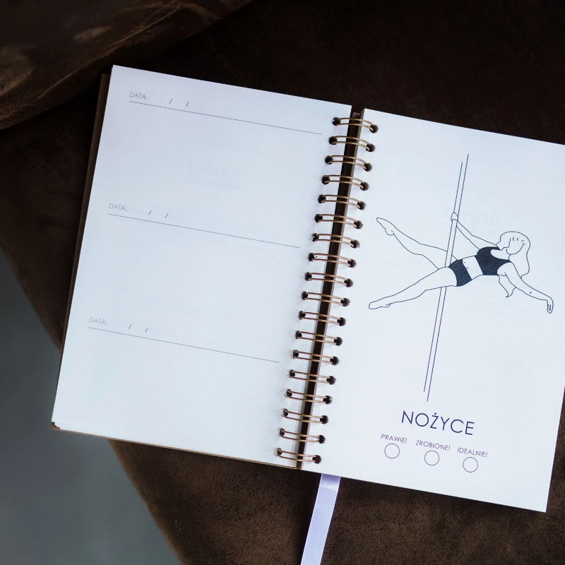 Planer Pole Dance Beginner — strona z figurą Nożyce i miejscem na notatki