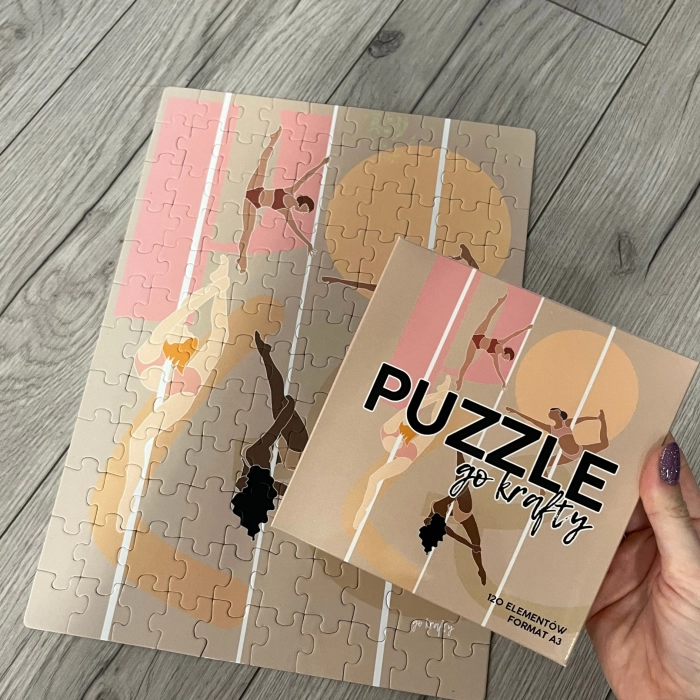 Puzzle Pole Dance — ułożony obrazek z tancerkami obok pudełka
